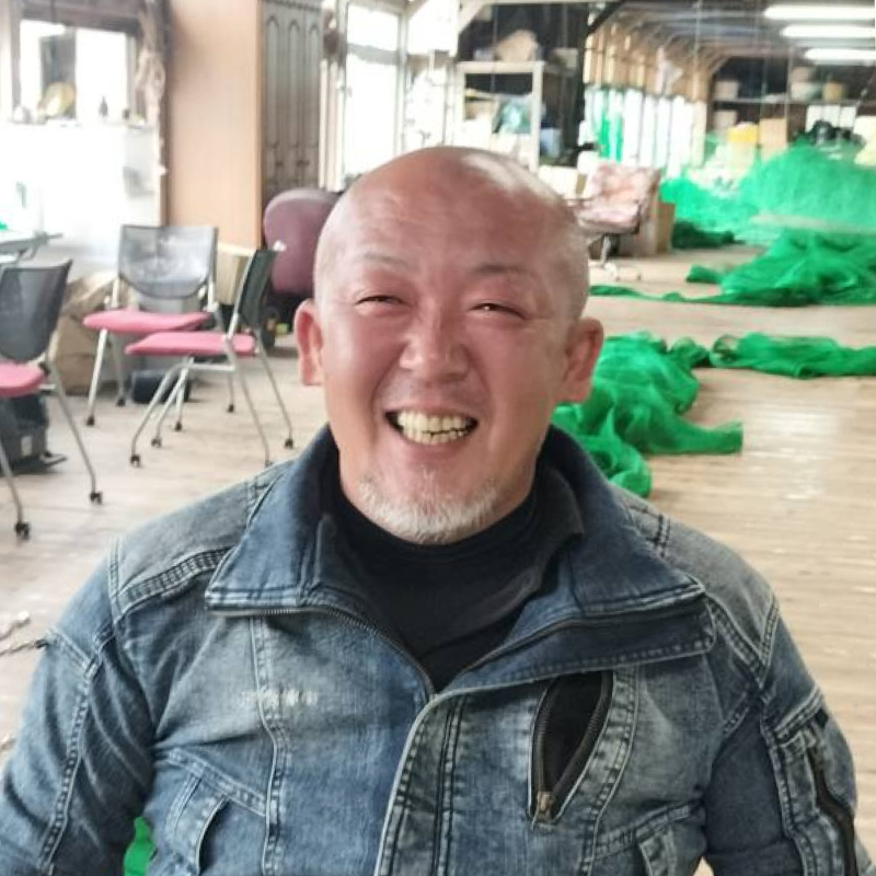 小川製網の社長の笑顔の写真